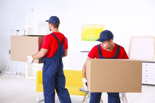 Complaint form and moving boxes beside a removal van service