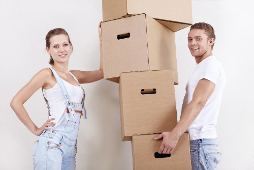 Professional team organizing items inside a Wandsworth removal van