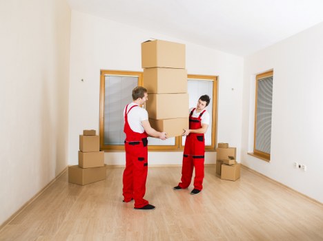 Boxes and furniture prepared for a flat move in a Wandsworth apartment