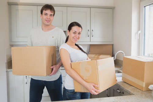 Packed household boxes and furniture ready for transport